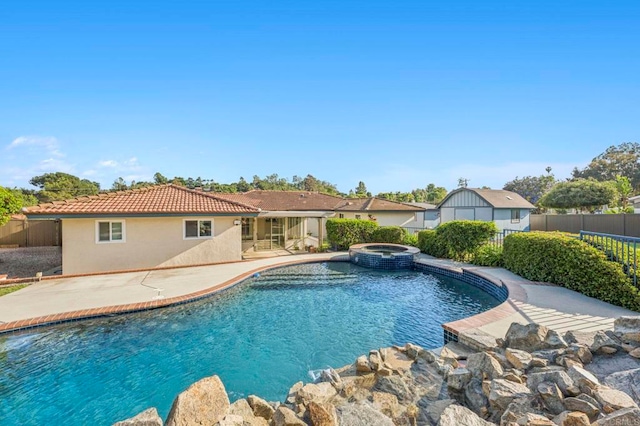 525 Hilo Way, Vista, CA 92081 - view of swimming pool featuring a fenced backyard, a patio area, and a pool with connected hot tub