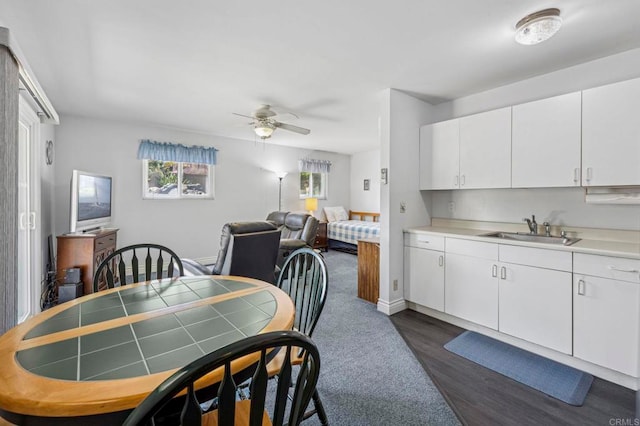 525 Hilo Way, Vista, CA 92081 - dining room with dark wood-style flooring, plenty of natural light, and a ceiling fan