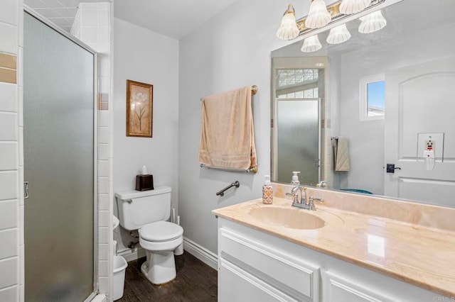 525 Hilo Way, Vista, CA 92081 - bathroom with vanity, a shower stall, and wood finished floors
