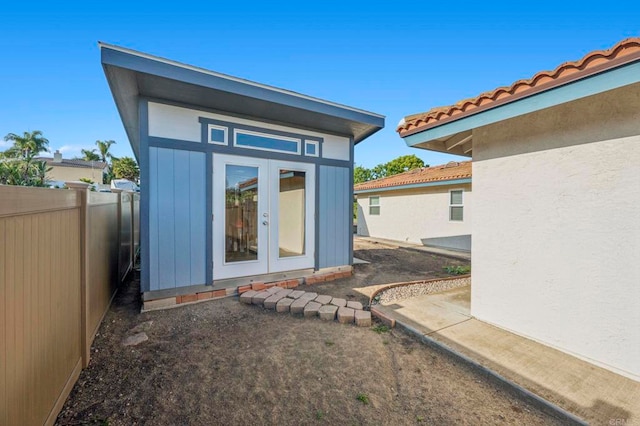 525 Hilo Way, Vista, CA 92081 - rear view of property with an outbuilding and a tiled roof