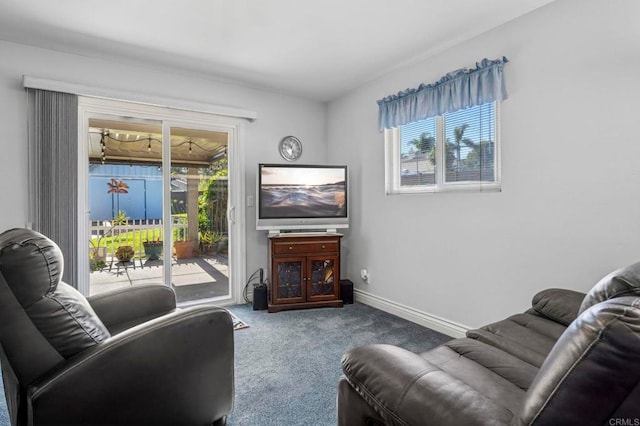 525 Hilo Way, Vista, CA 92081 - carpeted living area featuring baseboards