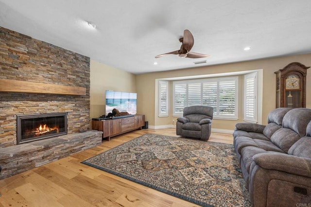 525 Hilo Way, Vista, CA 92081 - living room featuring wood finished floors, a fireplace, a ceiling fan, and recessed lighting