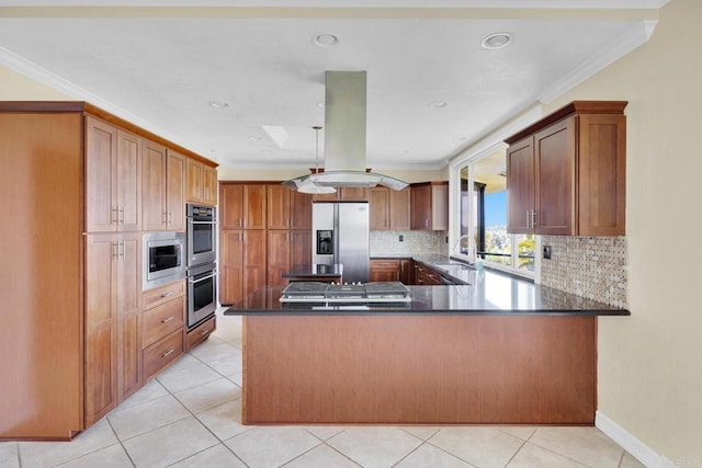 1138 Via Mil Cumbres, Solana Beach, CA 92075 - kitchen with stainless steel appliances, a peninsula, decorative backsplash, island range hood, and crown molding