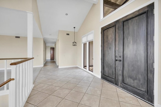 1138 Via Mil Cumbres, Solana Beach, CA 92075 - empty room with light tile patterned floors, high vaulted ceiling, and beam ceiling