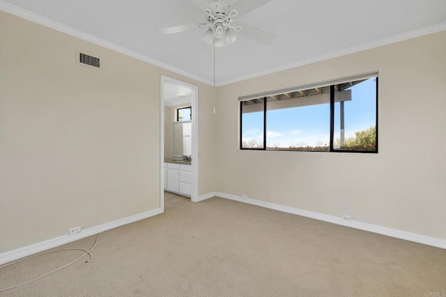 1138 Via Mil Cumbres, Solana Beach, CA 92075 - empty room with ceiling fan, light carpet, and crown molding