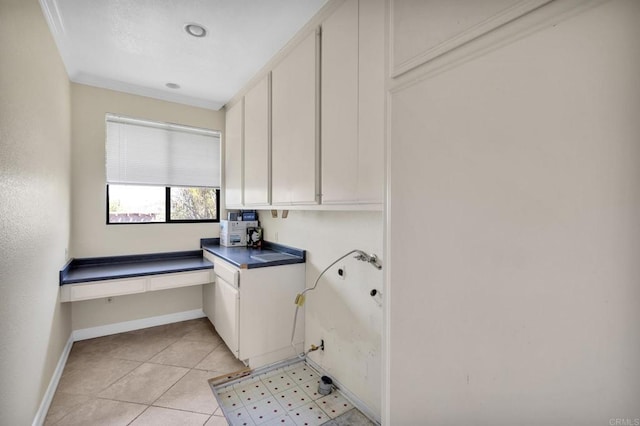 1138 Via Mil Cumbres, Solana Beach, CA 92075 - washroom with cabinet space and baseboards