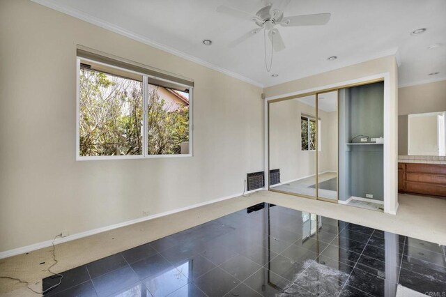1138 Via Mil Cumbres, Solana Beach, CA 92075 - empty room featuring a ceiling fan and ornamental molding