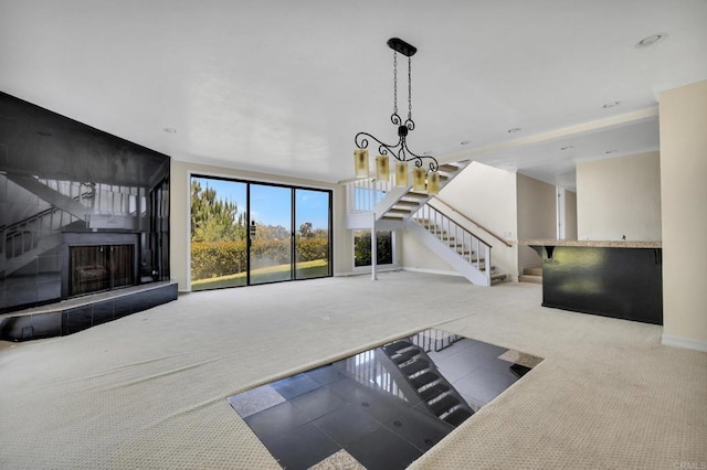 1138 Via Mil Cumbres, Solana Beach, CA 92075 - unfurnished living room with carpet, stairway, a chandelier, and recessed lighting