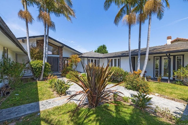1138 Via Mil Cumbres, Solana Beach, CA 92075 - view of front of home featuring stucco siding and a front yard
