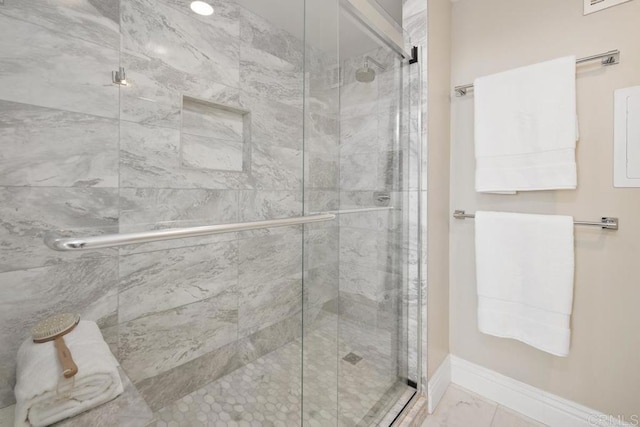 2500 Torrey Pines Rd Unit 1202, La Jolla, CA 92037 - bathroom featuring a stall shower and marble look tiles