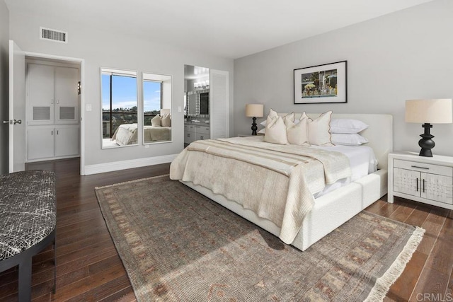 2500 Torrey Pines Rd Unit 1202, La Jolla, CA 92037 - bedroom with dark wood-style flooring and baseboards