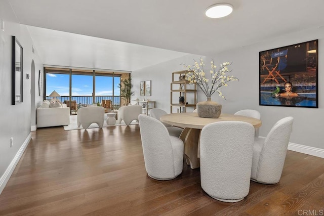 2500 Torrey Pines Rd Unit 1202, La Jolla, CA 92037 - dining space featuring wood finished floors and baseboards