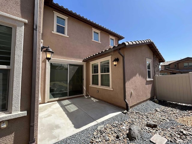 35909 Shetland Hls E, Fallbrook, CA 92028 - back of house with stucco siding and a patio
