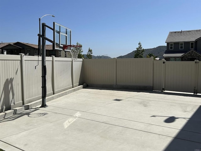 35909 Shetland Hls E, Fallbrook, CA 92028 - view of patio with a mountain view and a gate