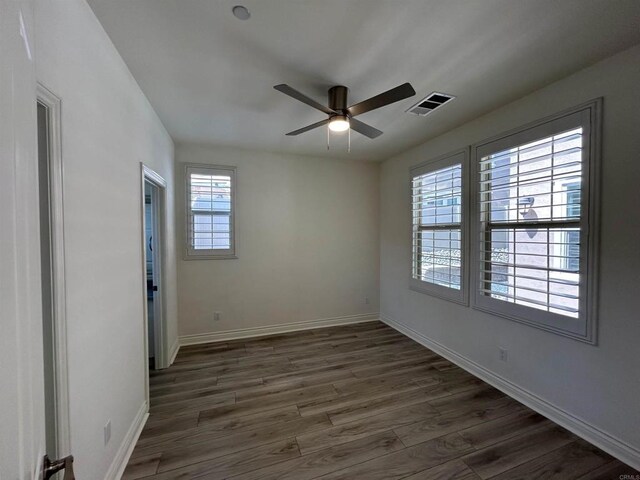 35909 Shetland Hls E, Fallbrook, CA 92028 - unfurnished room with ceiling fan and dark wood finished floors