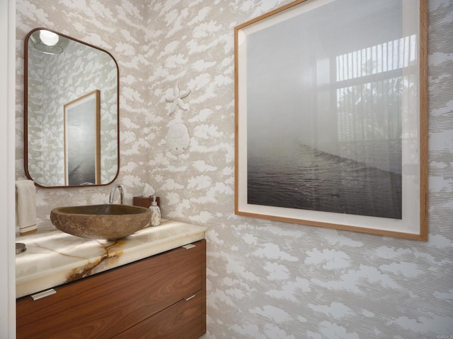 265 Coast Blvd Unit 9, La Jolla, CA 92037 - bathroom with wallpapered walls and vanity