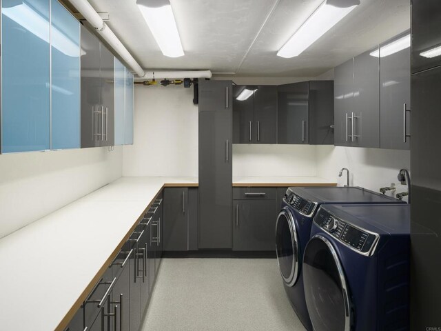265 Coast Blvd Unit 9, La Jolla, CA 92037 - laundry area featuring cabinet space and independent washer and dryer