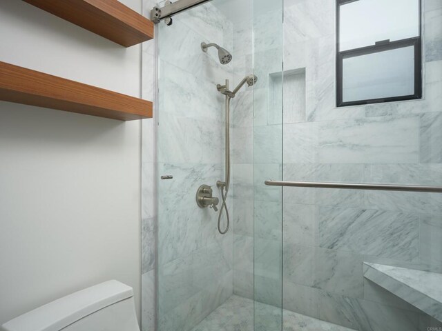 265 Coast Blvd Unit 9, La Jolla, CA 92037 - bathroom featuring a shower stall and toilet