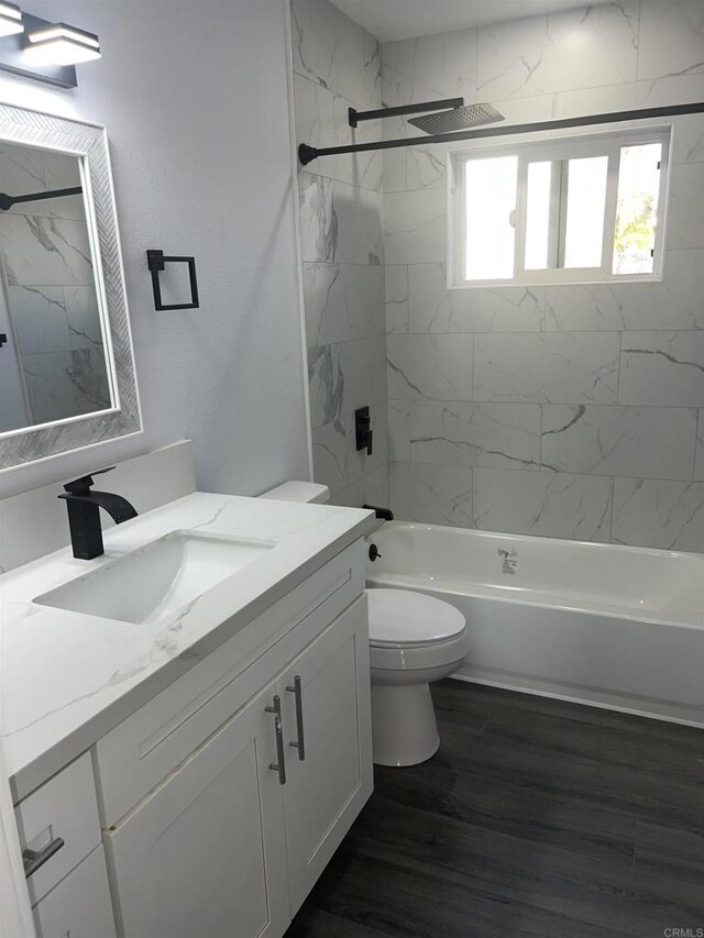 633 Kempton, Spring Valley, CA 91977 - bathroom featuring vanity, shower / tub combination, and wood finished floors