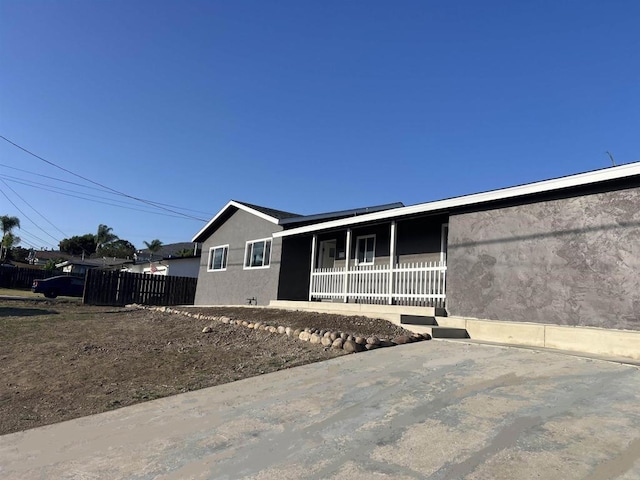 633 Kempton, Spring Valley, CA 91977 - view of front of home featuring covered porch and stucco siding