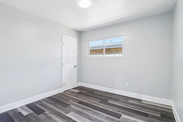 1947 D Ave, National City, CA 91950 - spare room with baseboards and dark wood finished floors