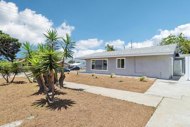 1947 D Ave, National City, CA 91950 - single story home with stucco siding and roof with shingles