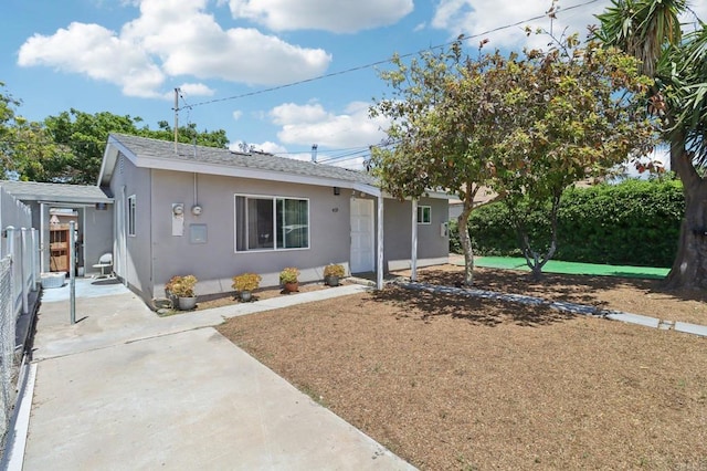 1947 D Ave, National City, CA 91950 - view of front of house featuring stucco siding and a shingled roof