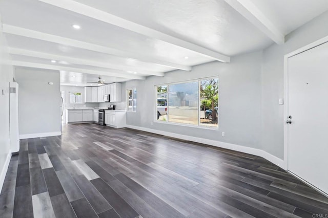 1947 D Ave, National City, CA 91950 - unfurnished living room with beam ceiling, dark wood-type flooring, and recessed lighting