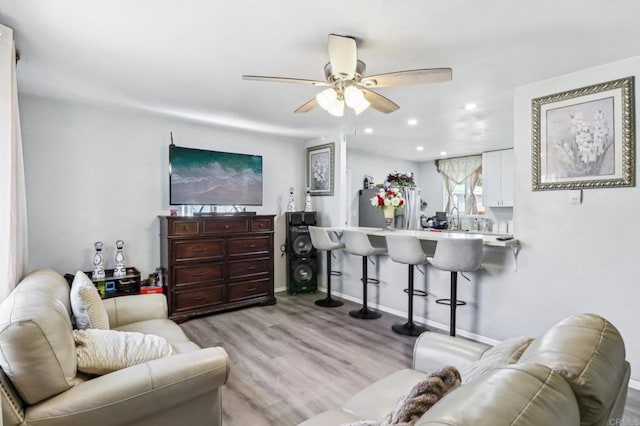 1947 D Ave, National City, CA 91950 - living area featuring wood finished floors, ceiling fan, and recessed lighting