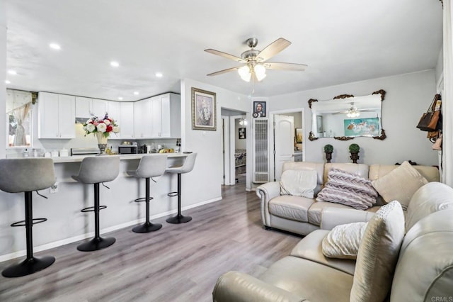 1947 D Ave, National City, CA 91950 - living area featuring a ceiling fan, light wood finished floors, and recessed lighting