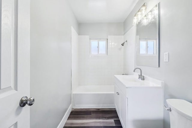 1947 D Ave, National City, CA 91950 - full bathroom featuring vanity, wood finished floors, and shower / washtub combination