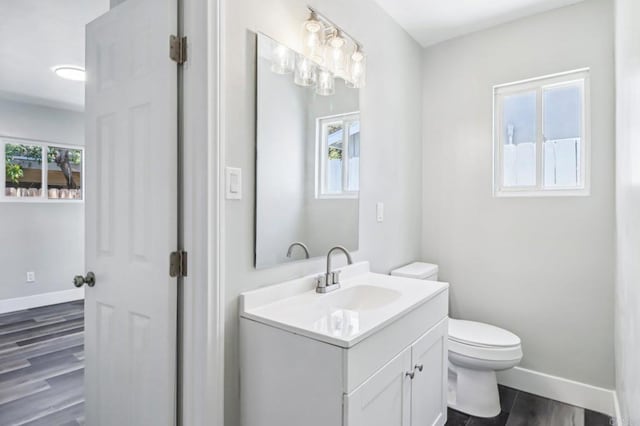 1947 D Ave, National City, CA 91950 - bathroom featuring vanity, wood finished floors, and plenty of natural light