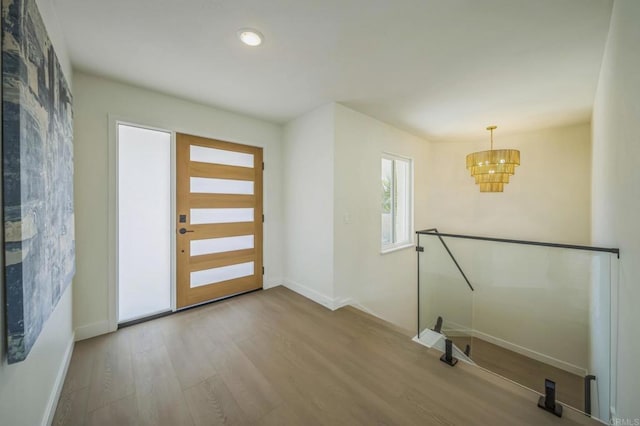 1763 Sky Loft Ln, Encinitas, CA 92024 - foyer featuring a chandelier, wood finished floors, and recessed lighting
