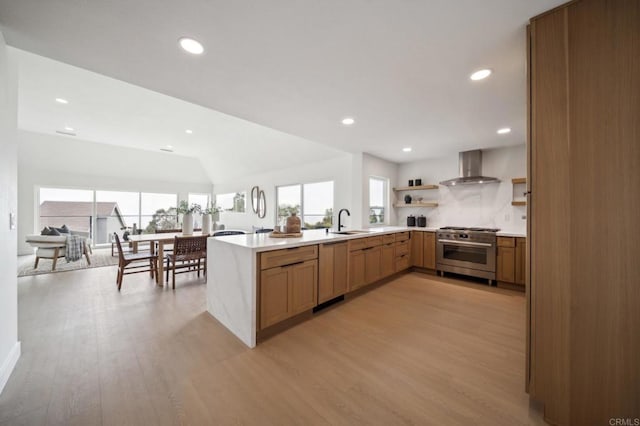 1763 Sky Loft Ln, Encinitas, CA 92024 - kitchen featuring high end range, dishwashing machine, open shelves, wall chimney exhaust hood, and plenty of natural light