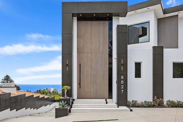 6627 Muirlands Dr, La Jolla, CA 92037 - doorway to property with stucco siding