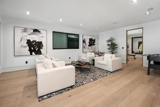 6627 Muirlands Dr, La Jolla, CA 92037 - living area featuring wood finished floors and recessed lighting
