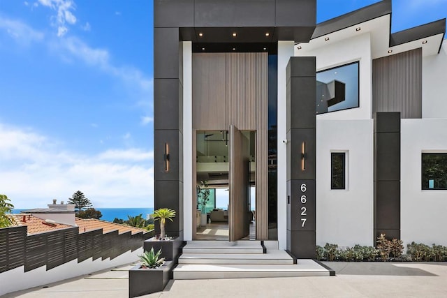 6627 Muirlands Dr, La Jolla, CA 92037 - doorway to property with stucco siding