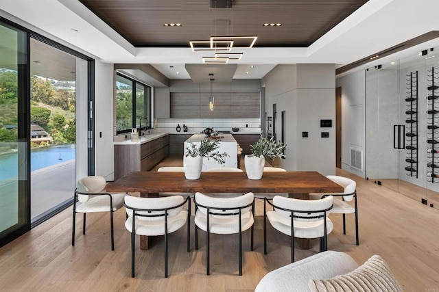 6627 Muirlands Dr, La Jolla, CA 92037 - dining room featuring a raised ceiling, light wood finished floors, wood ceiling, and recessed lighting