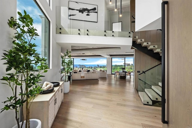 6627 Muirlands Dr, La Jolla, CA 92037 - foyer entrance with a high ceiling and light wood-style floors