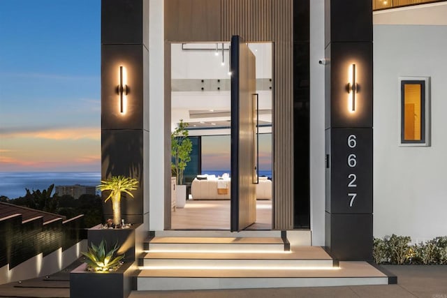 6627 Muirlands Dr, La Jolla, CA 92037 - doorway to property featuring stucco siding