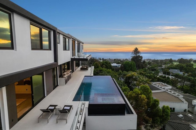 6627 Muirlands Dr, La Jolla, CA 92037 - view of pool featuring a water view and a pool with connected hot tub