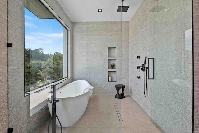 6627 Muirlands Dr, La Jolla, CA 92037 - full bath with a freestanding tub, a walk in shower, and tile patterned flooring