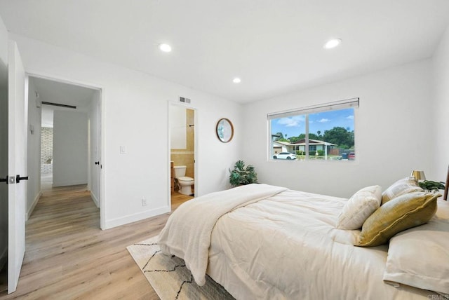 1472 Loma Ln, Chula Vista, CA 91911 - bedroom with light wood-type flooring, recessed lighting, and connected bathroom