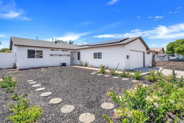 1472 Loma Ln, Chula Vista, CA 91911 - single story home featuring a garage, stucco siding, and solar panels