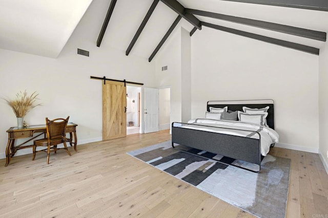 18 Gateview Dr, Fallbrook, CA 92028 - bedroom with hardwood / wood-style floors, a barn door, beam ceiling, and high vaulted ceiling