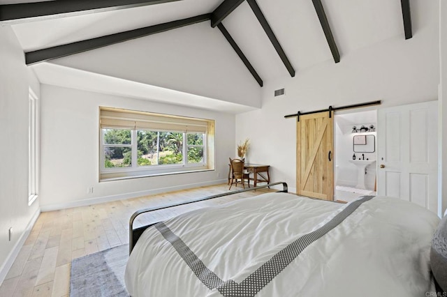 18 Gateview Dr, Fallbrook, CA 92028 - bedroom featuring a barn door, wood finished floors, beam ceiling, high vaulted ceiling, and connected bathroom