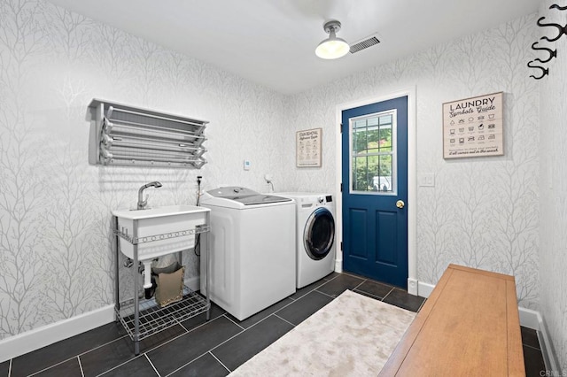 18 Gateview Dr, Fallbrook, CA 92028 - washroom featuring wallpapered walls, washing machine and clothes dryer, and dark tile patterned floors