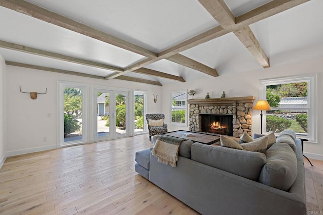 18 Gateview Dr, Fallbrook, CA 92028 - living area with beam ceiling, a stone fireplace, coffered ceiling, light wood finished floors, and french doors