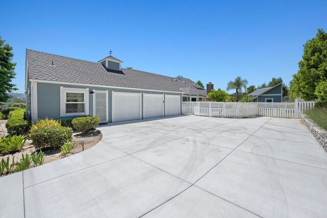 18 Gateview Dr, Fallbrook, CA 92028 - rear view of house featuring concrete driveway and a garage