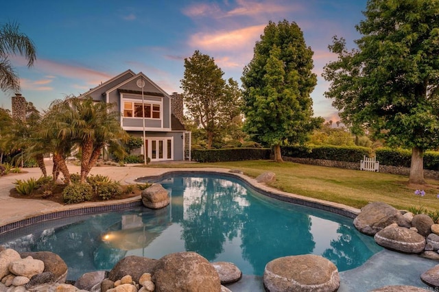 18 Gateview Dr, Fallbrook, CA 92028 - outdoor pool featuring french doors, a lawn, and a patio